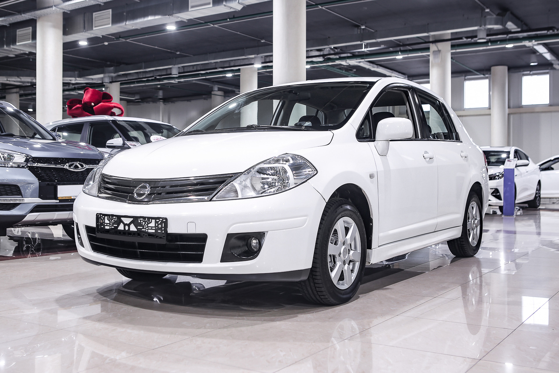 Купить Tiida с пробегом